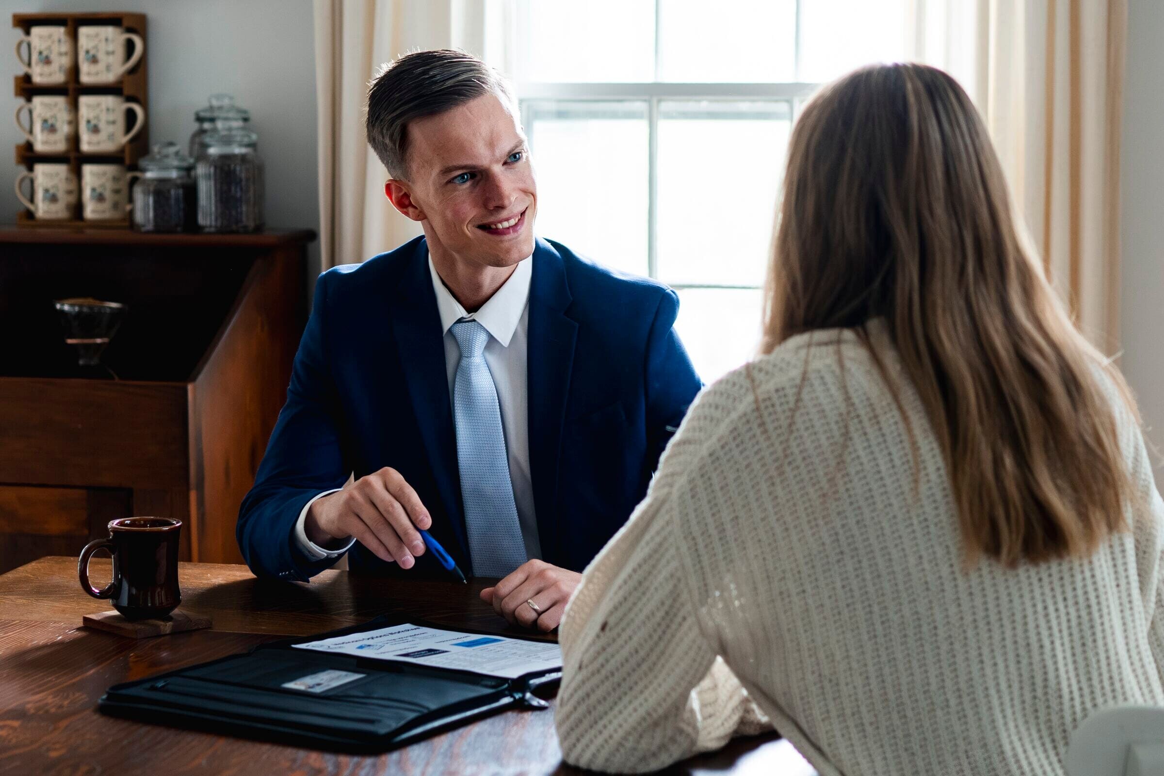 Spencer Linton going over Medicare plan options with a client in Lancaster County, Pennsylvania