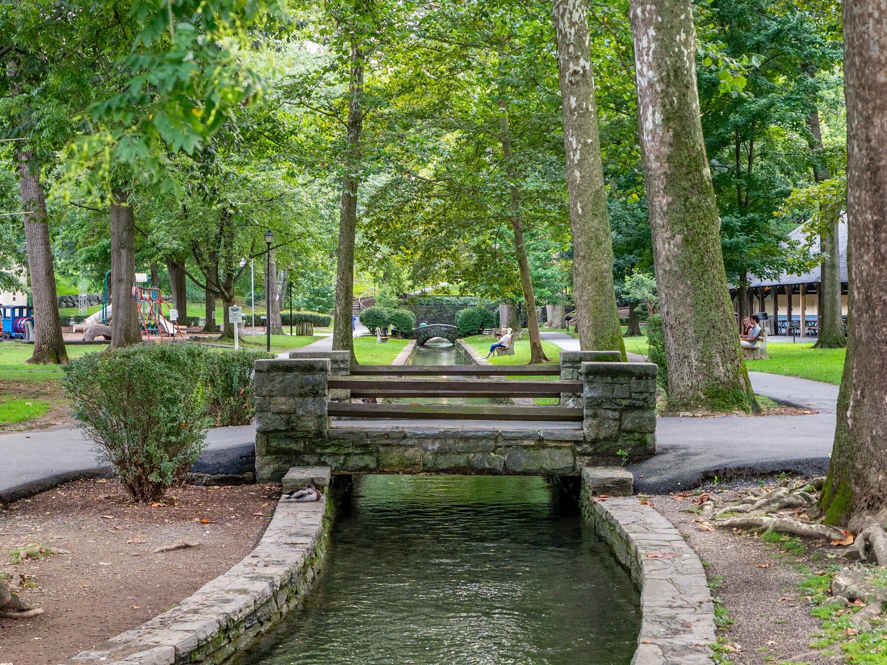 The spring run and stone footbridge in Lititz Springs Park, Lititz, Pennsylvania